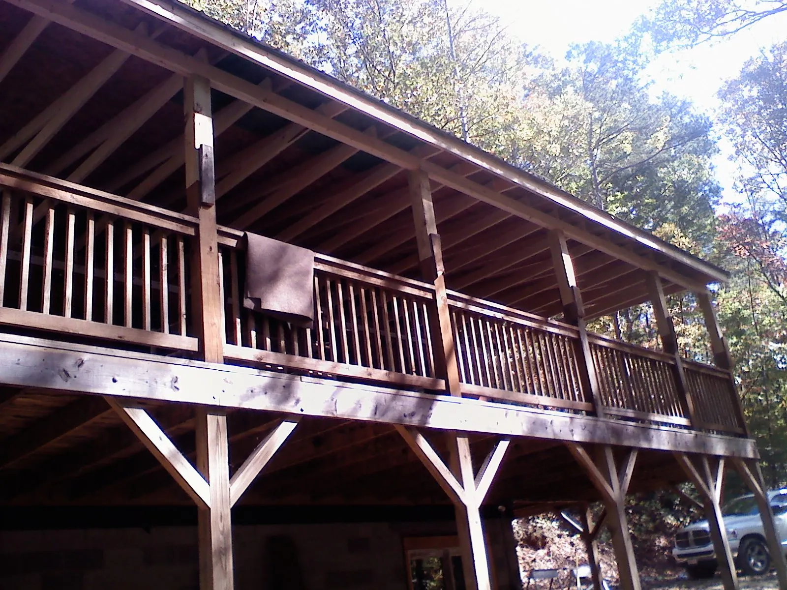 Timber framing under a new elevated porch and deck — Roof Leak Repair in Rancho Mirage by Roofing Brothers